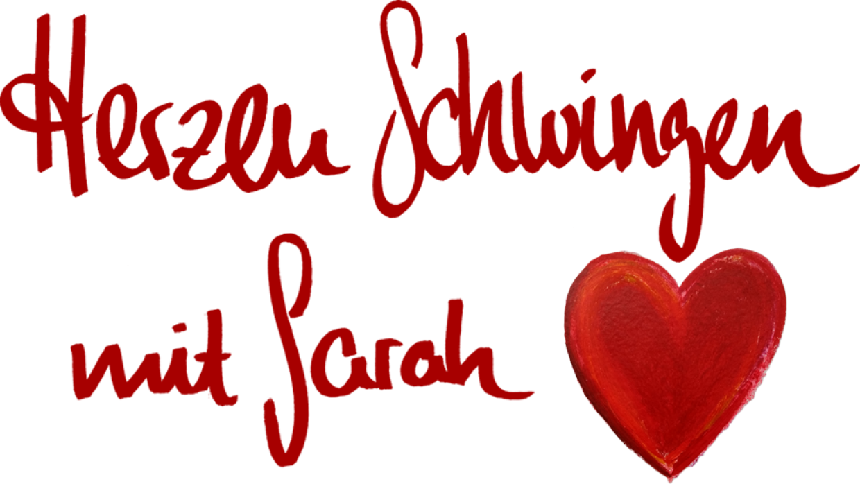 Rotes Herz mit Schrift auf weißen Grund