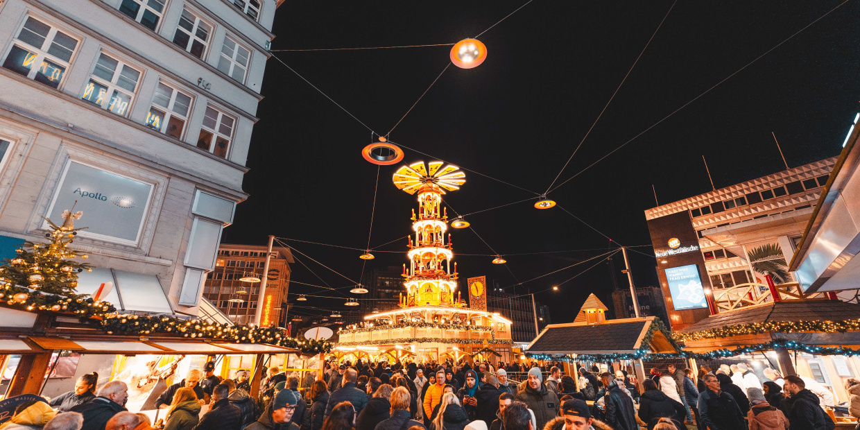 Adult Architecture Building City Clothing Female Hat Male Man Night Life People Person Urban Woman