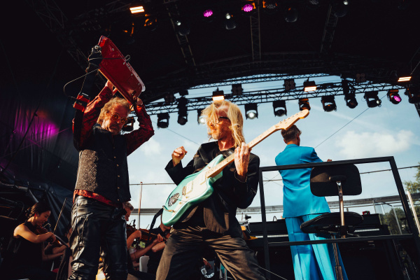 Adult Concert Crowd Female Group Performance Guitar Male Man Music Music Band Musical Instrument Musician Performer Person Woman