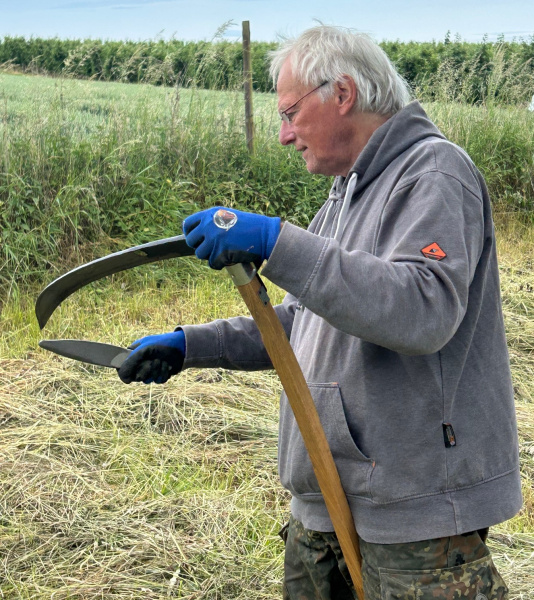 Uli Jablonowsky mit Sense